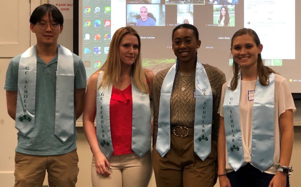 The four GCSP Seniors posing with their graduation stoles after their presentations