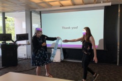 Beth Wee presenting stoll to Carly Harad