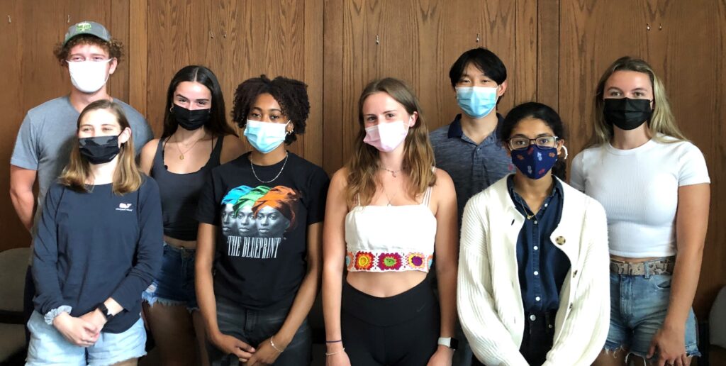 Class of 2022 and 2023 scholars posing with masks