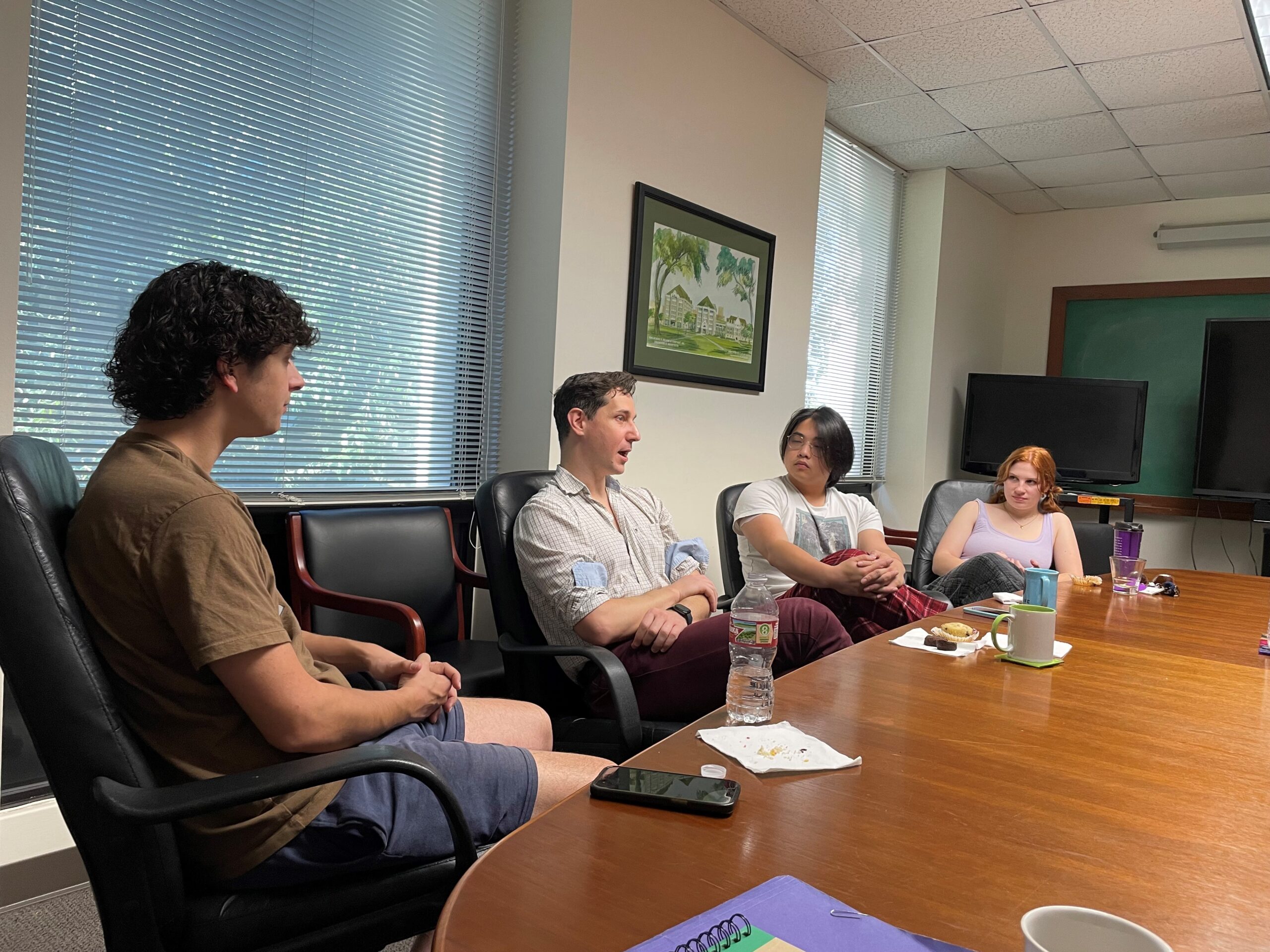 Dr. Maus talking to students. 