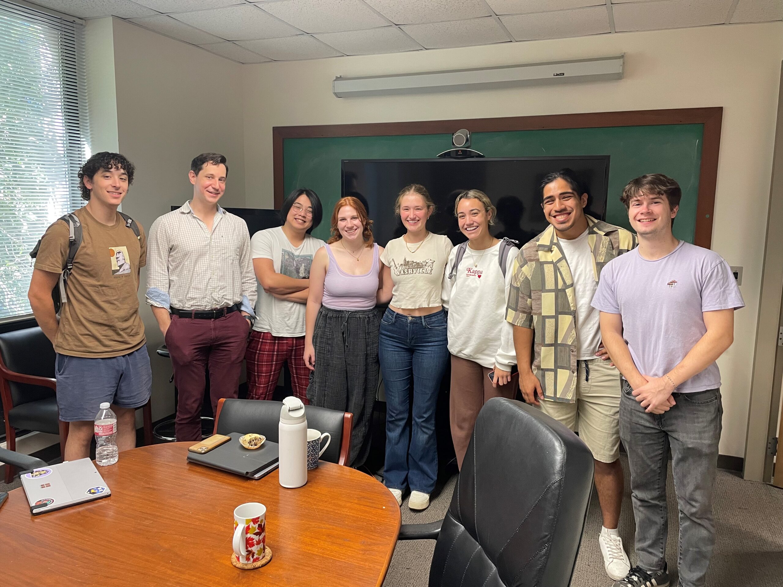 Group photo of scholars and Dr. Maus 